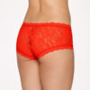 A model shown from the waist down (back view) wears the Hanky Panky Signature Lace Boyshorts in Salsa - a bright red. They are made of a sheer stretch lace.