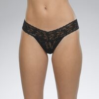 A model shown from the waist down wears the Hanky Panky Signature lace Original Rise thong in black. It is a stretch lace orignial rise thong panty.