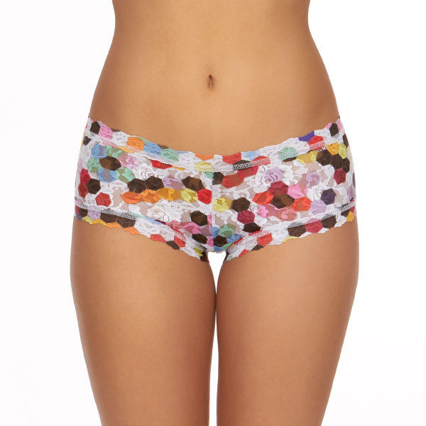 A model shown from the waist down faces forward showing the front of the hanky panky honeycomb boyshort panties. The print is a multicolored honeycomb pattern on a stretch lace.