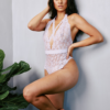 model wears kilo brava teddy in lilac stretch lace