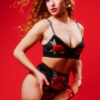 model wears kilo brava rose appliqué crushed velvet triangle bralette, garter belt, and g-string thong panty