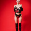model wears the kilo brava rose appliqué underwire underbust bustier