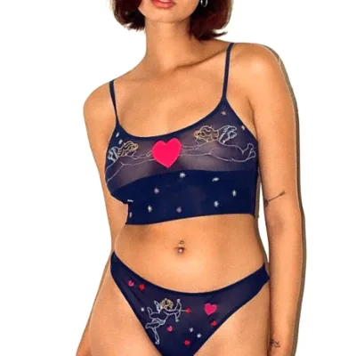 model wears the only hearts angel baby embroidered crop cami and matching thong