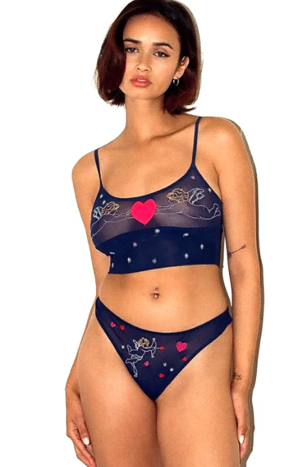 model wears the only hearts angel baby embroidered crop cami and matching thong