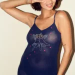 model wears the only hearts angel baby embroidered sheer mini slip