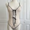 only hearts coucou lola two-toned brigitte body teddy in cream with black trim (on a dress form)