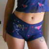 model wears the only hearts embroidered angel baby pamela shorts