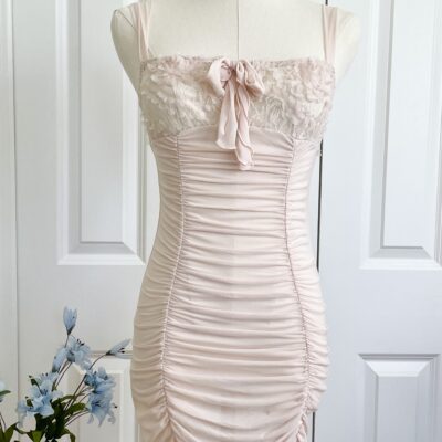 mannequin featuring the only hearts simone ruched boudoir slip in blush pink mesh