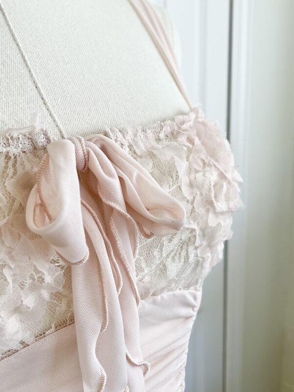 close-up front view of the bust area of the only hearts simone ruched boudoir slip (on mannequin)