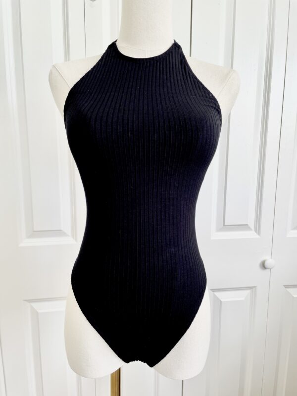 front view of the only hearts eco rib bodysuit in black (on a mannequin)