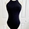 front view of the only hearts eco rib bodysuit in black (on a mannequin)
