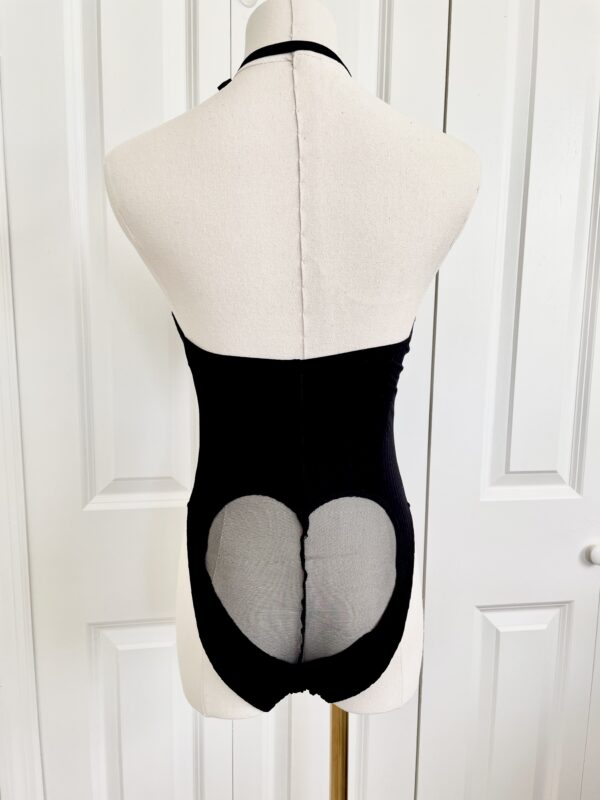 back view of the only hearts eco rib bodysuit in black (on a mannequin)