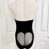 back view of the only hearts eco rib bodysuit in black (on a mannequin)