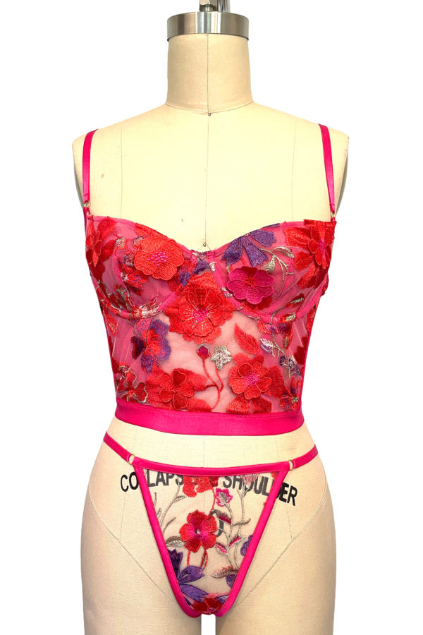mannequin posed with the kilo brava bright 3D floral embroidered underwire bustier and g-string thong