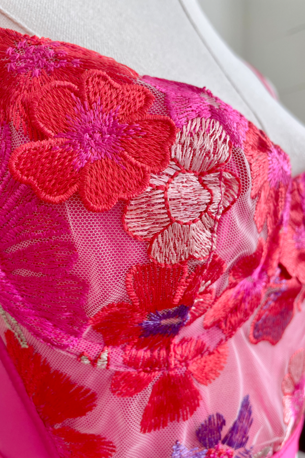 close up view of the front bus area (on mannequin) of the kilo brava bright 3d floral underwire bustier