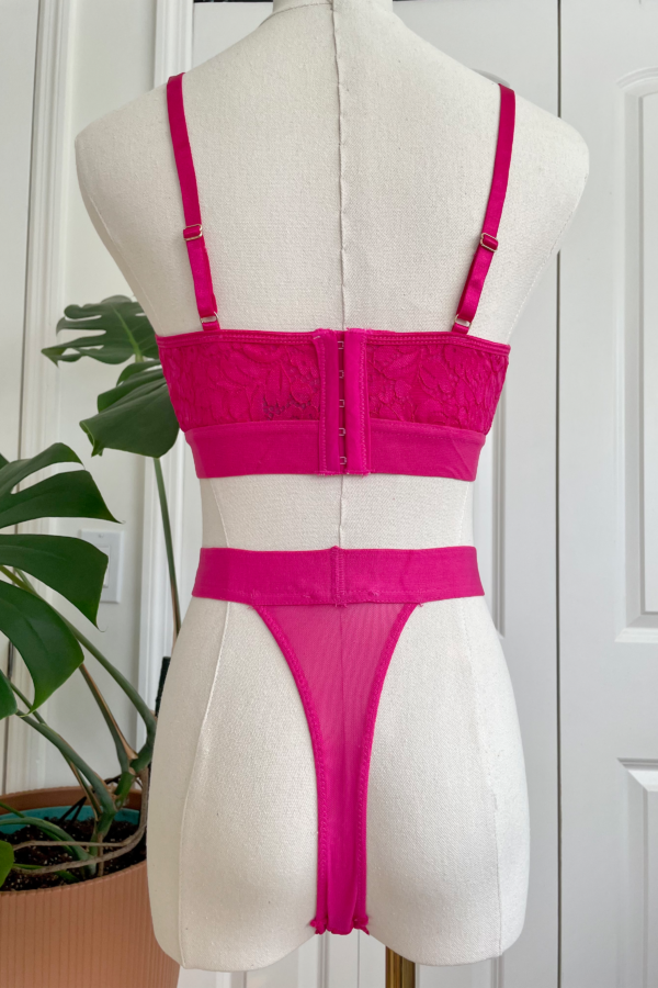 back view of kilo brava azalea pink stretch lace bralette and high leg thong set