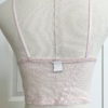 back view of only hearts calais lace longline bralette in petal pink lace