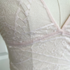 close up view of only hearts calais lace longline bralette in petal pink lace