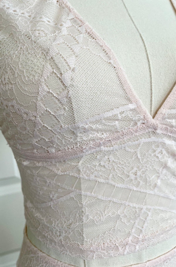 close up view of only hearts calais lace longline bralette in petal pink lace