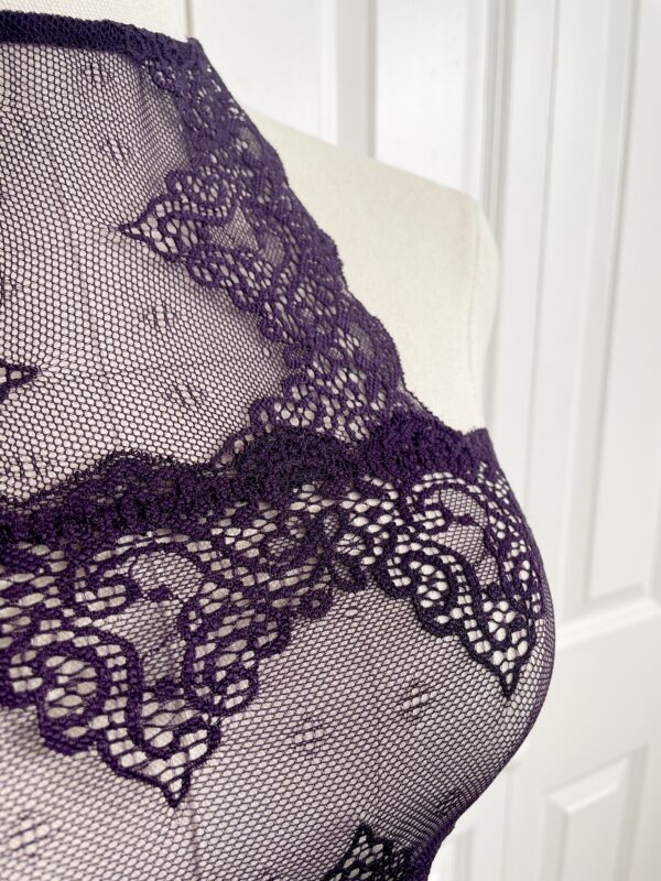 pictured on a dress form mannequin: close up of the only hearts halter so fine lace bodysuit teddy in purple.