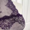 pictured on a dress form mannequin: close up of the only hearts halter so fine lace bodysuit teddy in purple.