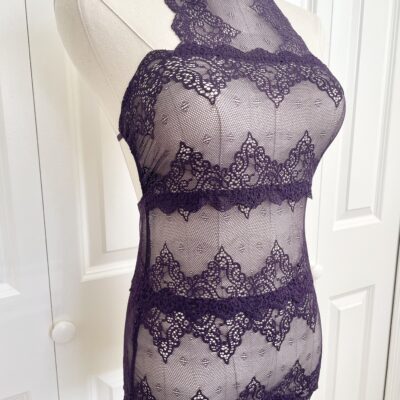 pictured on a dress form mannequin: the only hearts halter so fine lace bodysuit teddy in purple.