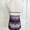 pictured on a dress form mannequin: back view of the only hearts halter so fine lace bodysuit teddy in purple.
