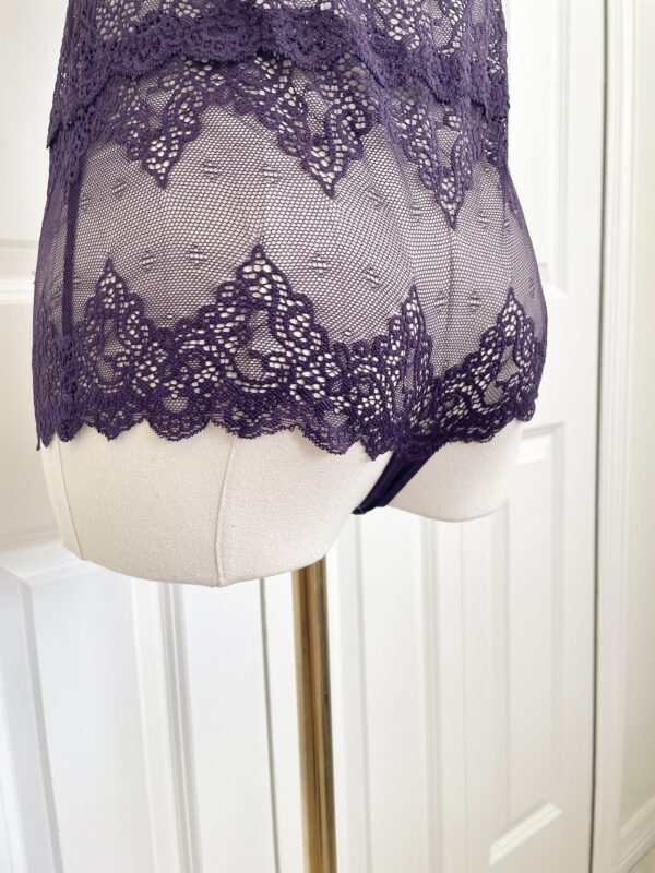 pictured on a dress form mannequin: back rear of the only hearts halter so fine lace bodysuit teddy in purple.