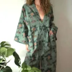 model wears the only hearts luv island cotton kaftan