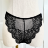 photo of a mannequin from the waist down in black lingerie. mannequin wears the Only Hearts So fine lace g-string thong panties in black lace
