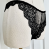 photo of a mannequin from the waist down in black lingerie. mannequin wears the Only Hearts So fine lace g-string thong panties in black lace