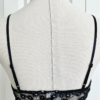 back view of the only hearts isabel embroidered black lace bralette