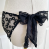 side view of the only hearts isabel embroidered black lace bikini brief