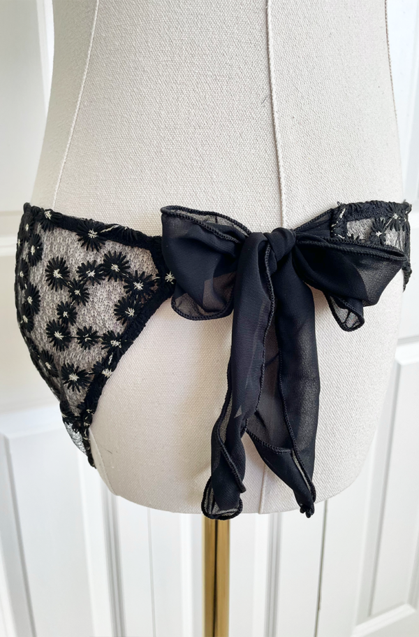 side view of the only hearts isabel embroidered black lace bikini brief