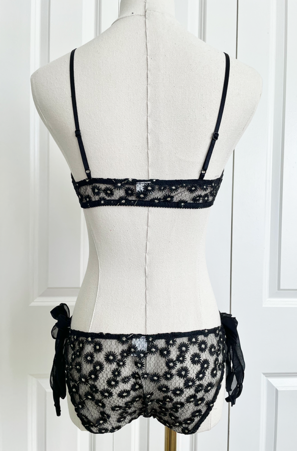 back view of the only hearts isabel embroidered black lace bralette and bikini brief