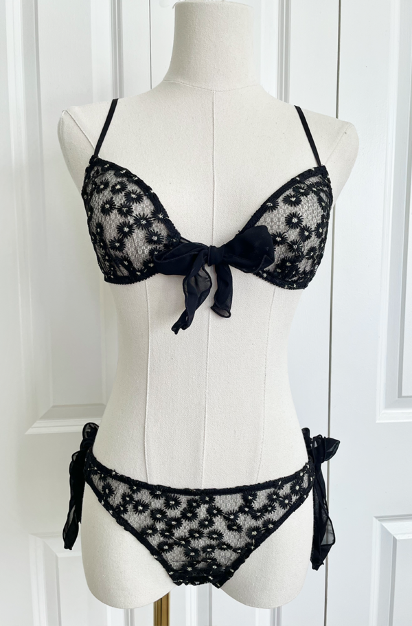 front view of the only hearts isabel embroidered black lace bralette and bikini brief