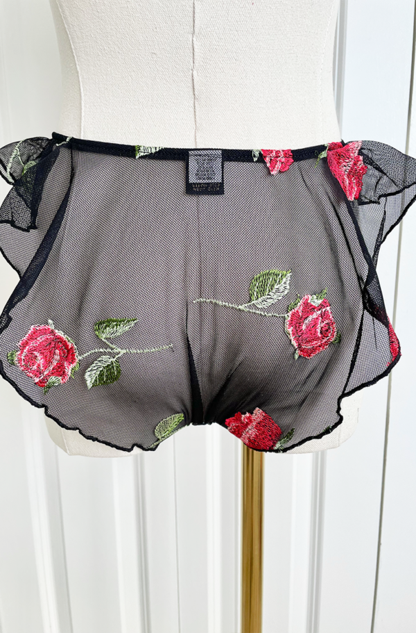 back view of a mannequin with the only hearts 'a rose is a rose' underwear on