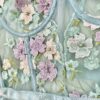 close up of the fabric of the Kilo Brava powder blue 3D floral underwire bodysuit