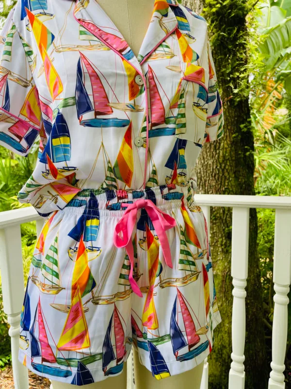 Satin Shortie PJ Set in Sail Away displayed on a mannequin, featuring vintage sailboat print, pink piping, and silky simulated silk fabric.