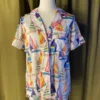 Satin Shortie PJ Set in Sail Away displayed on a mannequin, featuring vintage sailboat print, pink piping, and silky simulated silk fabric.