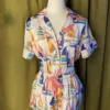 Satin Shortie PJ Set in Sail Away displayed on a mannequin, featuring vintage sailboat print, pink piping, and silky simulated silk fabric.
