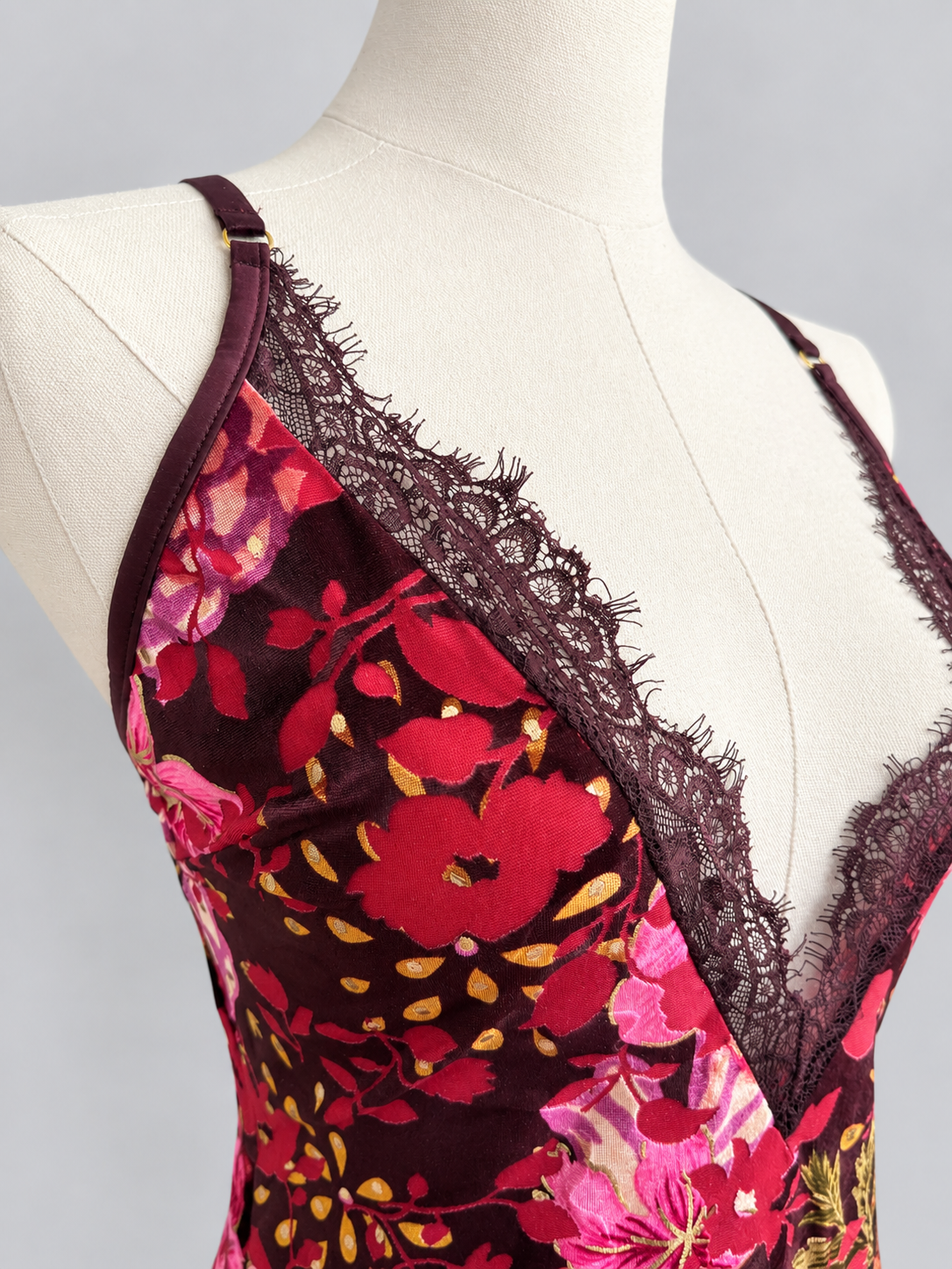 close up of the torso of the kilo brava tapestry slip on a mannequin in front of a gray background